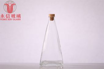 Low MOQ Customized short neck Delicate Fancy luxury New Design round glass bottle with custom bottom pattern